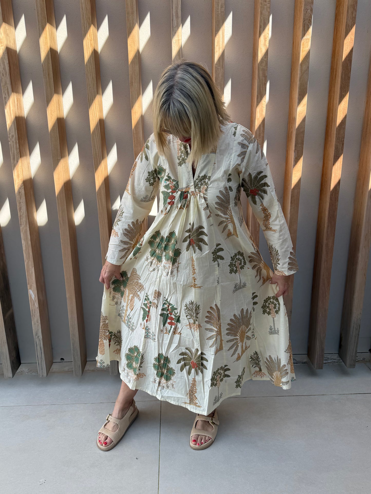 Cream dress with palm pattern
