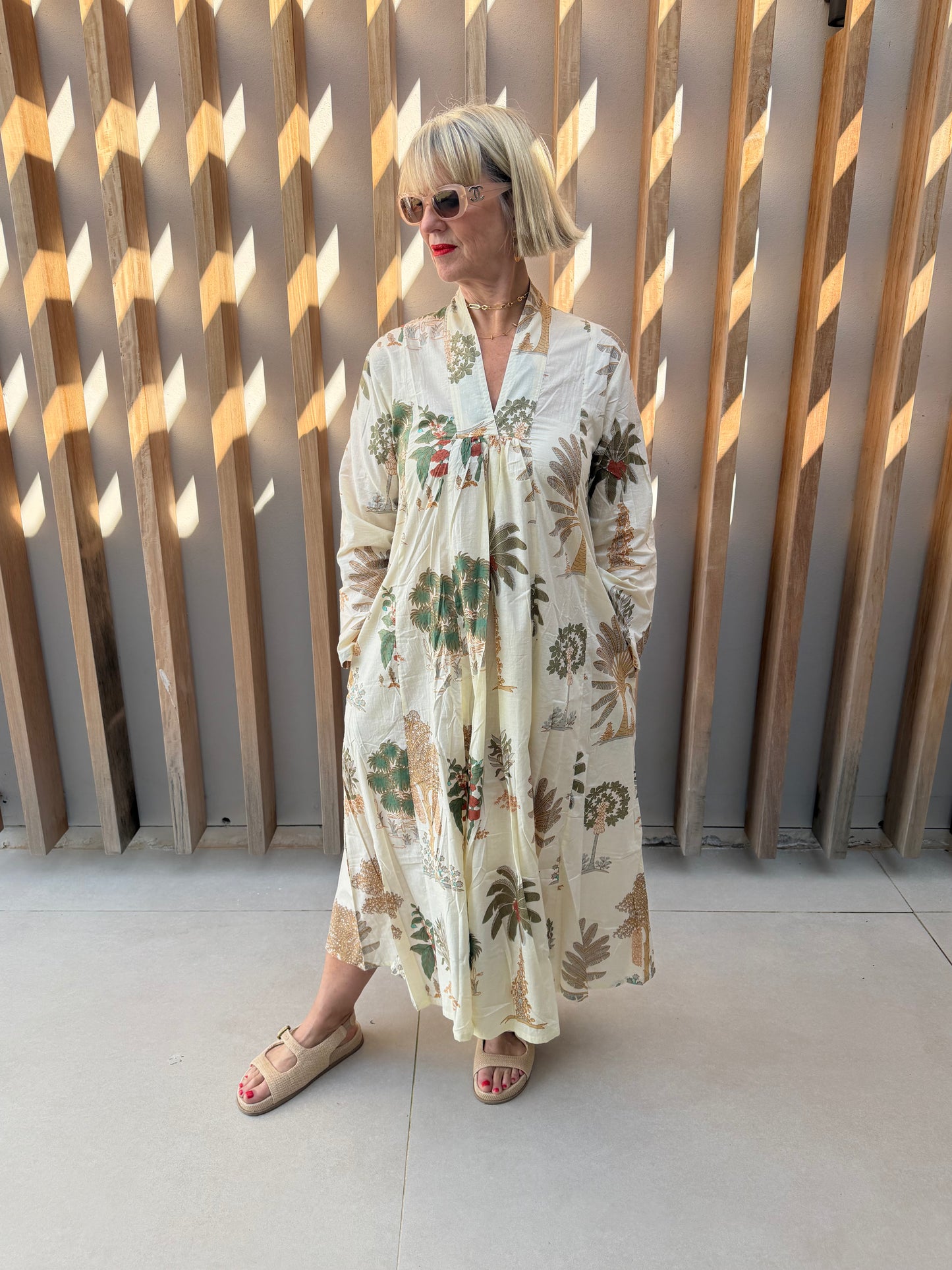 Cream dress with palm pattern