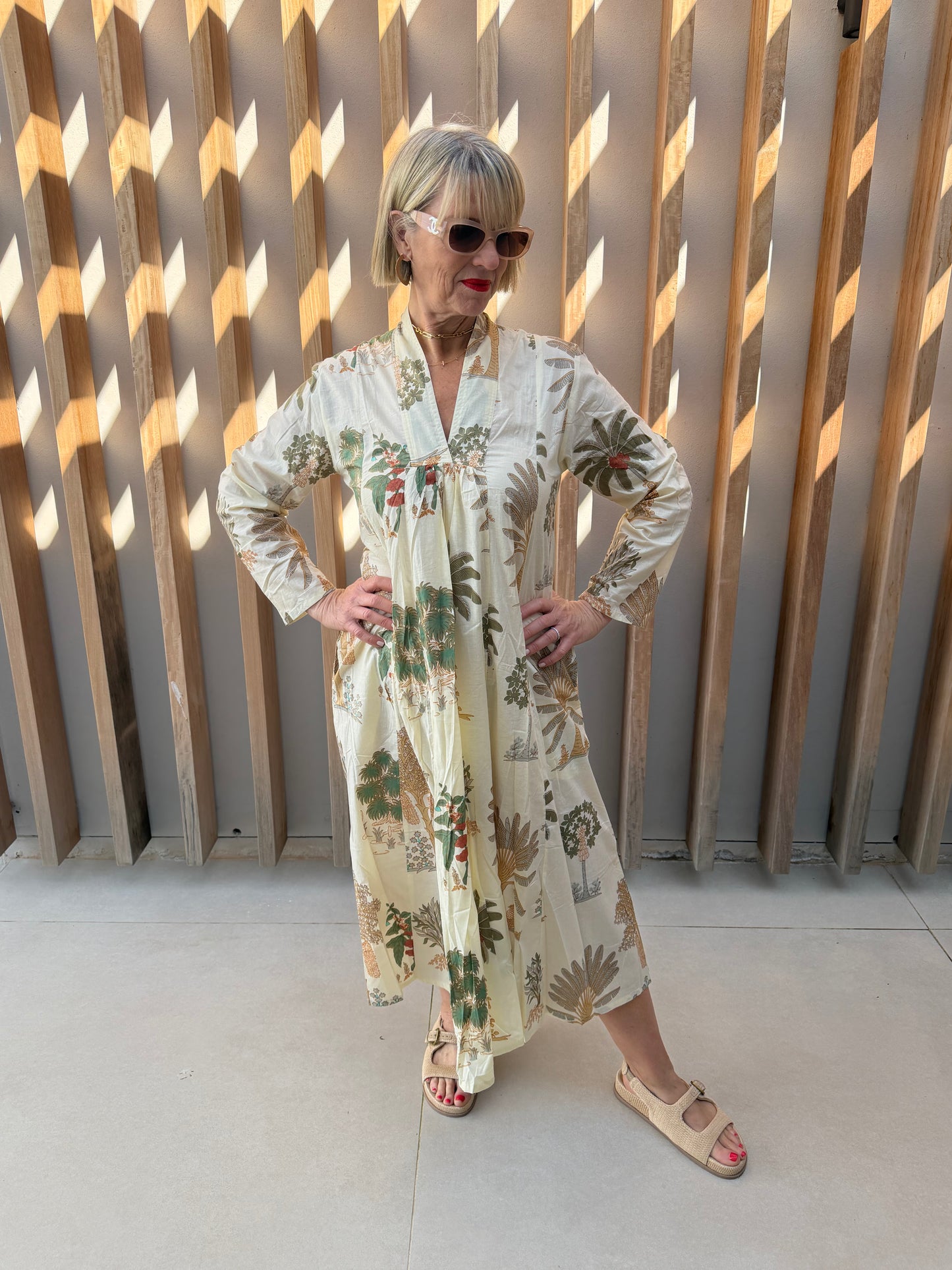 Cream dress with palm pattern