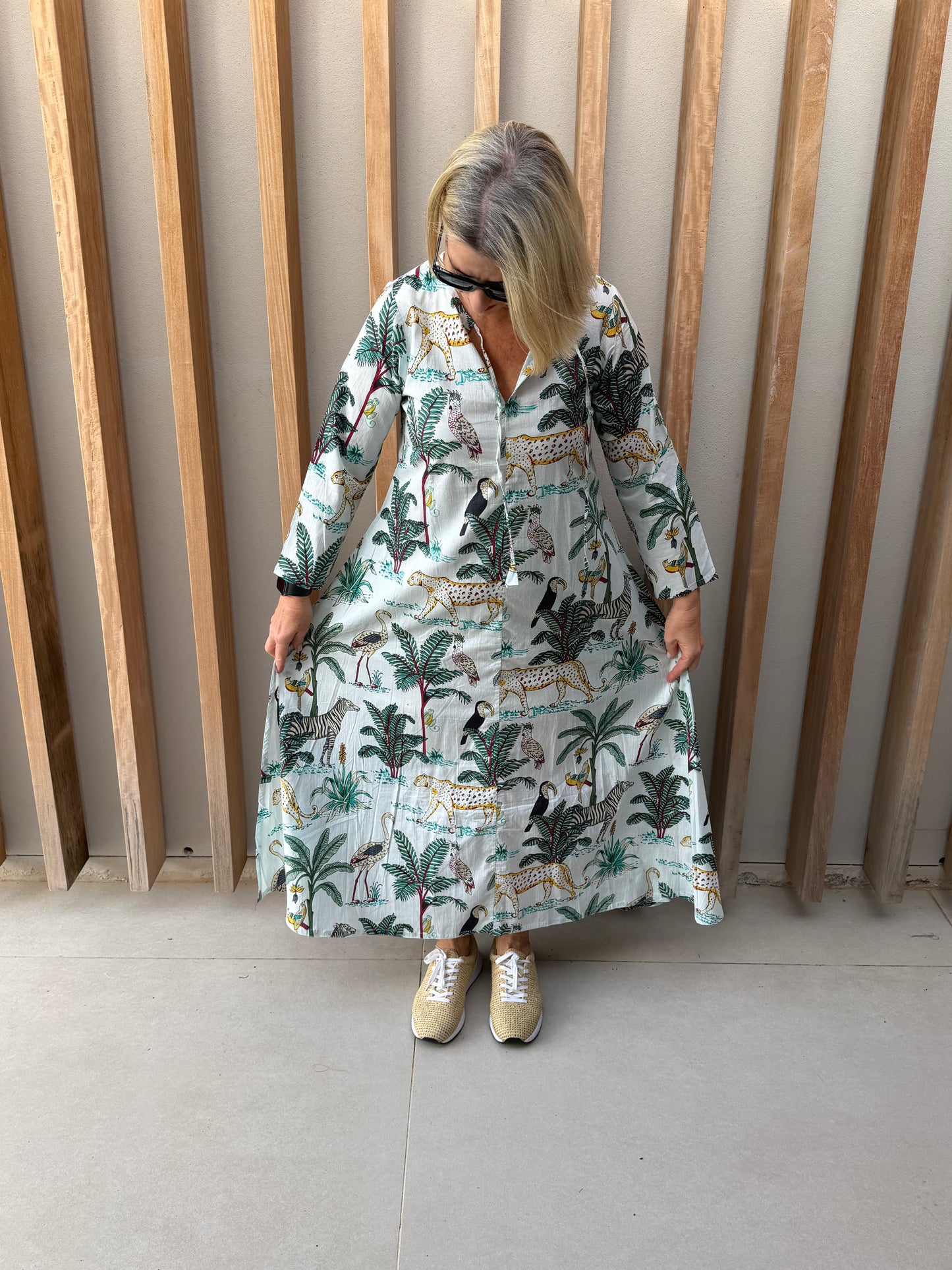White dress with green animal fan palm