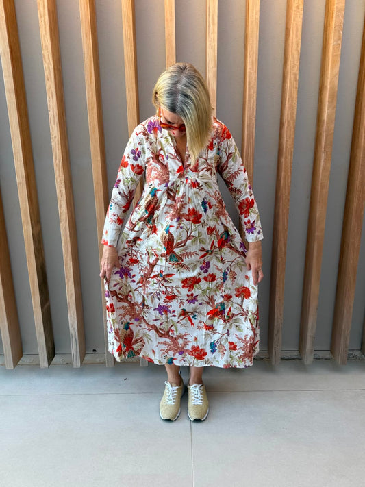 White dress with floral bird pattern