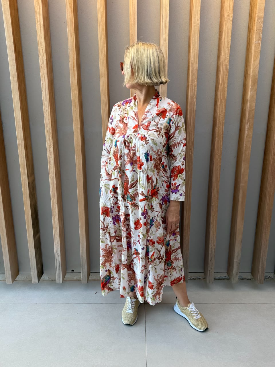 White dress with floral bird pattern