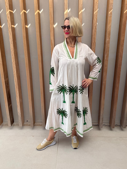 White dress with embroidered green palm