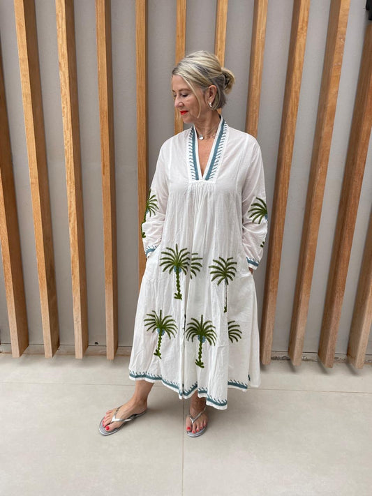 White dress with embroidered green floral palm