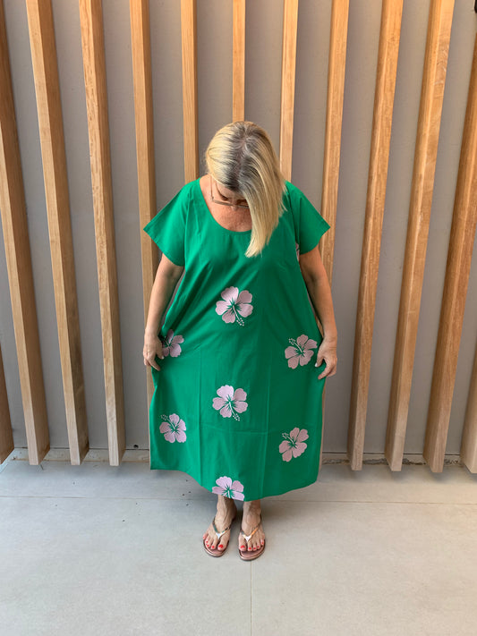 Green sleeveless dress with pink embroidered Hibiscus