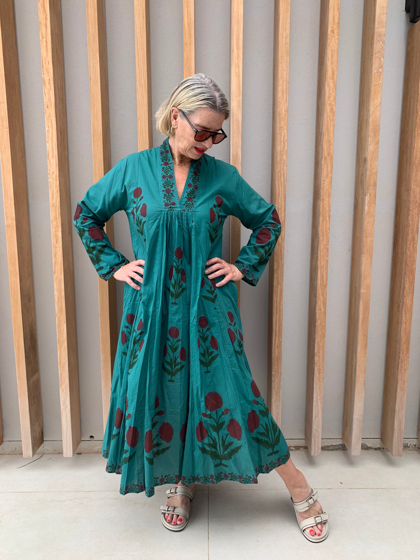 Green dress with red diasies pattern