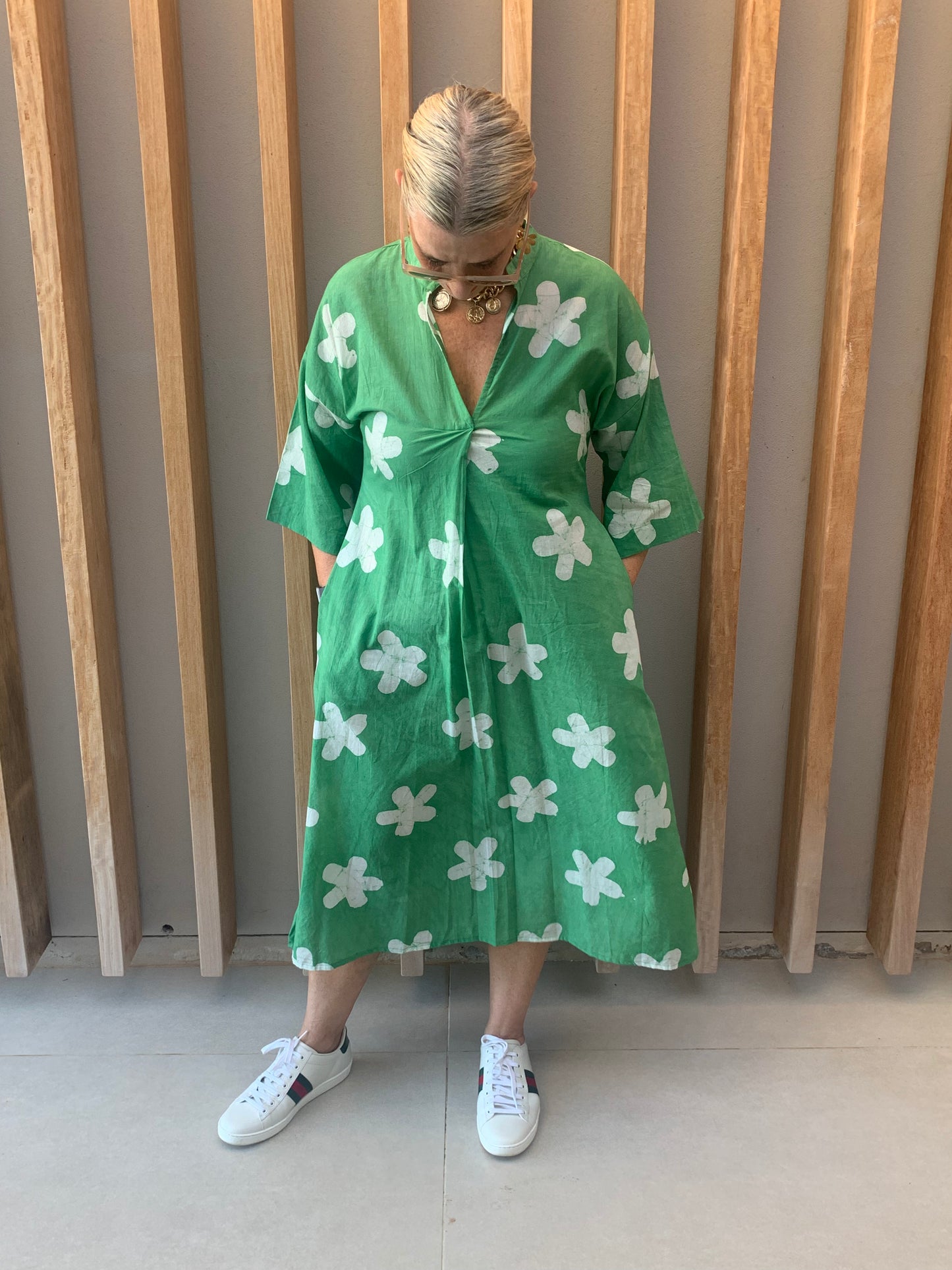 Green dress with white clover pattern