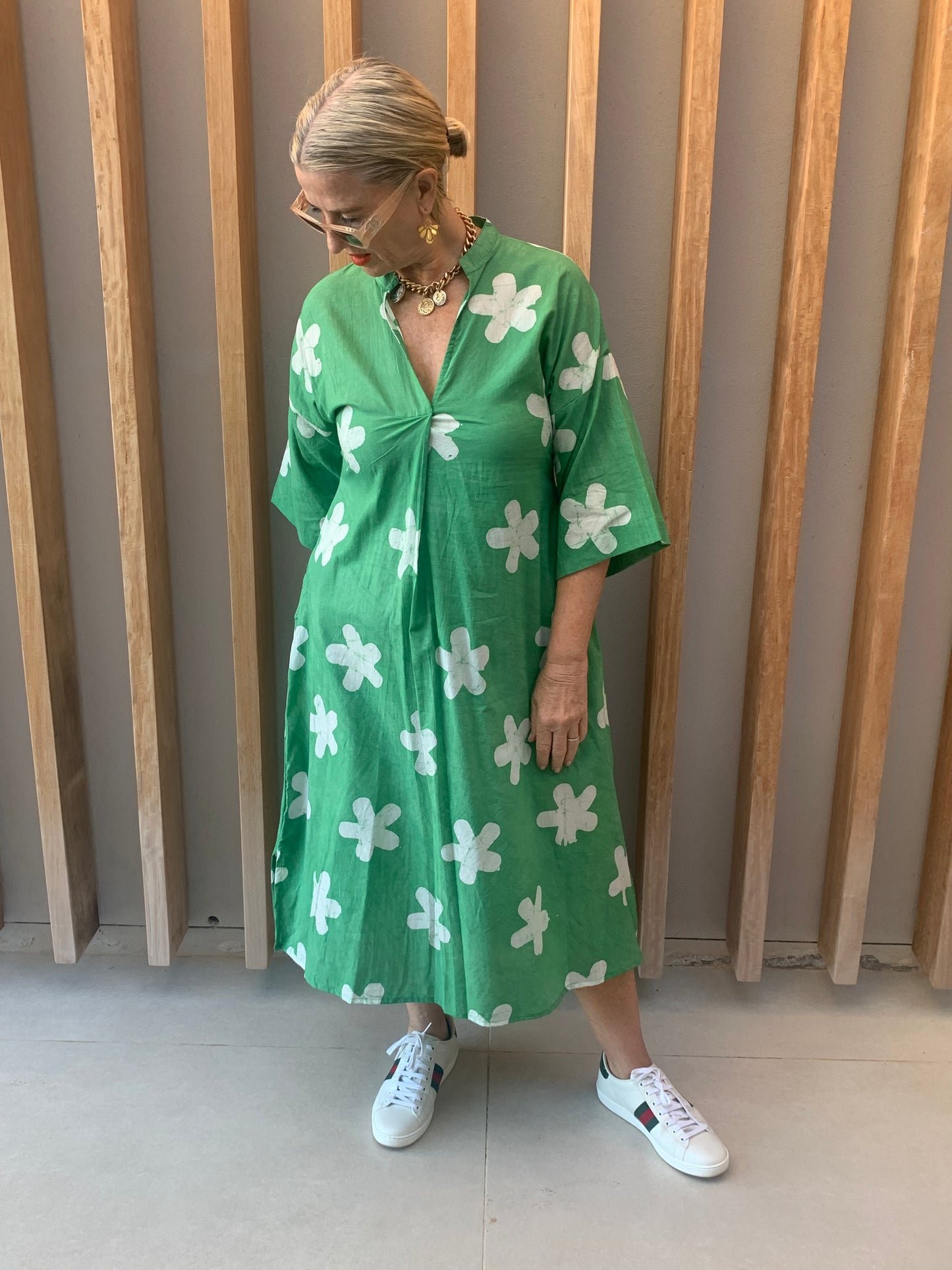 Green dress with white clover pattern