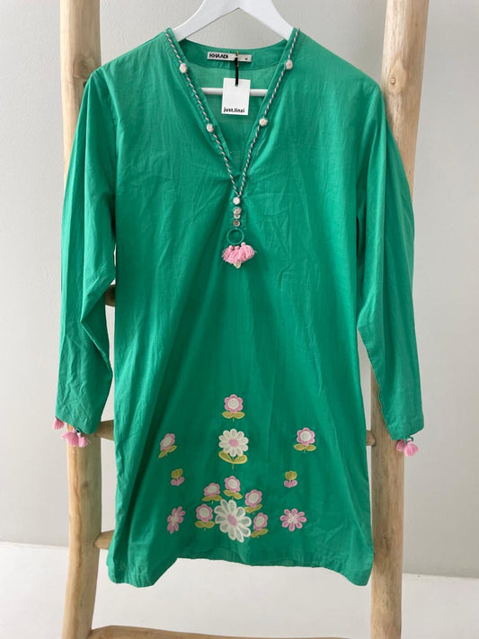 Green dress white floral embroidering