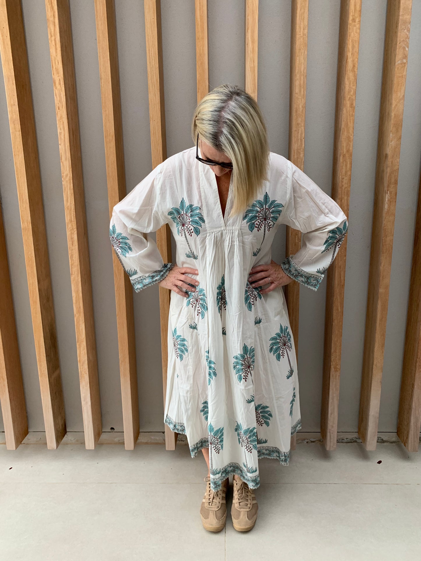 White dress with light blue palm pattern