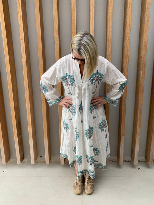 White dress with light blue palm pattern