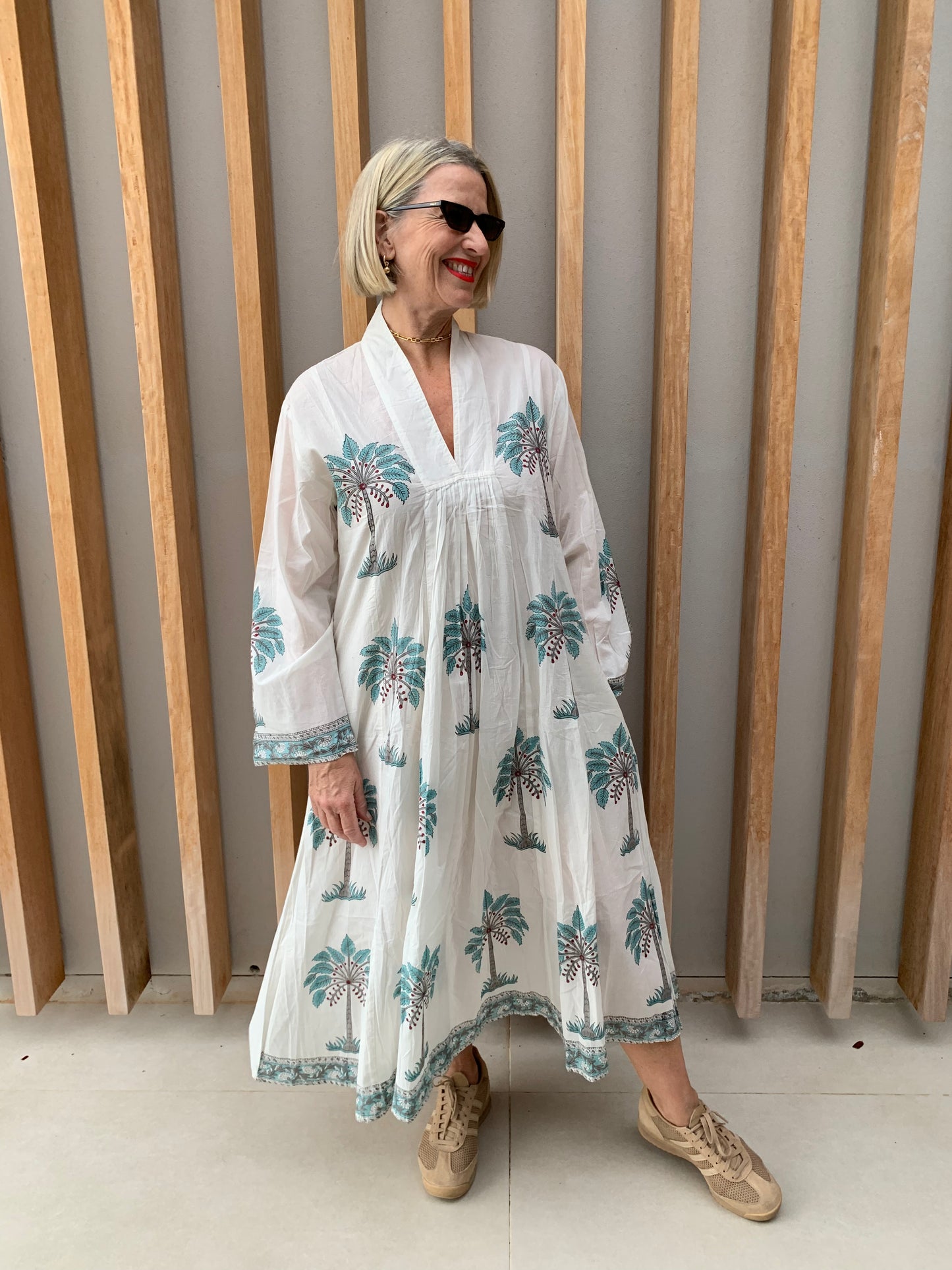 White dress with light blue palm pattern