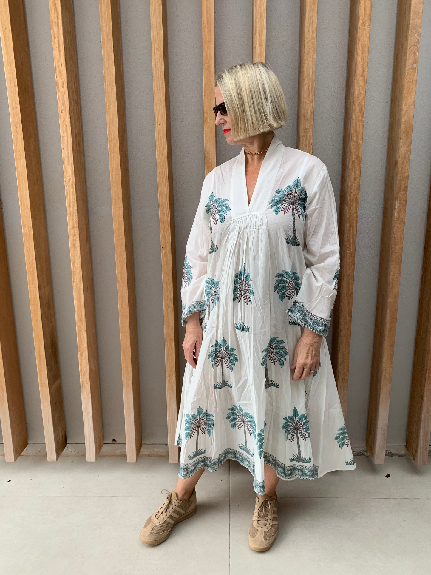 White dress with light blue palm pattern