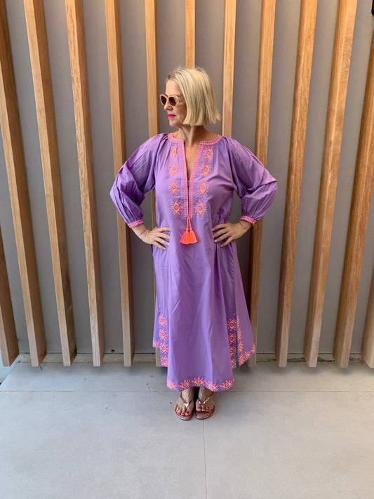 Mauve dress with embroidered orange geometric pattern
