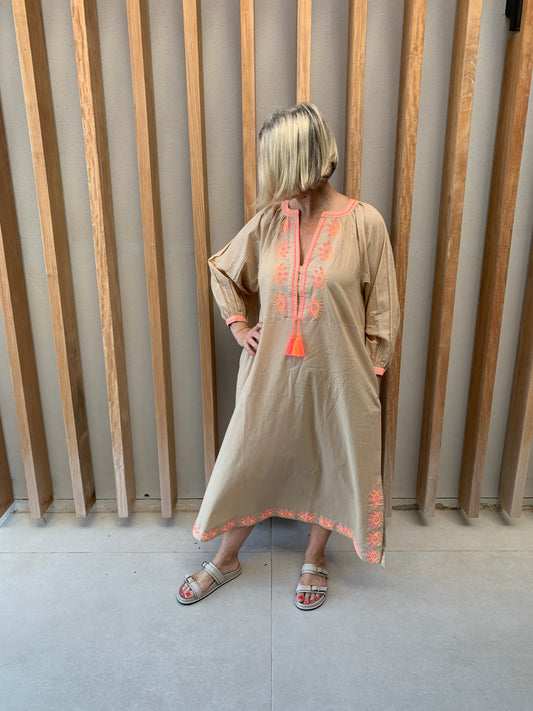 Nude colour dress with orange geometric pattern