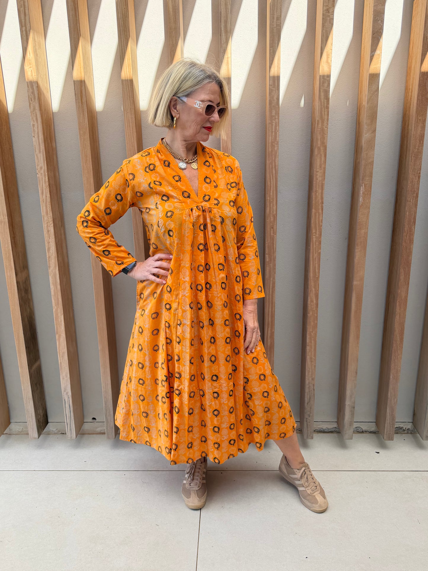 Orange geometric pattern dress