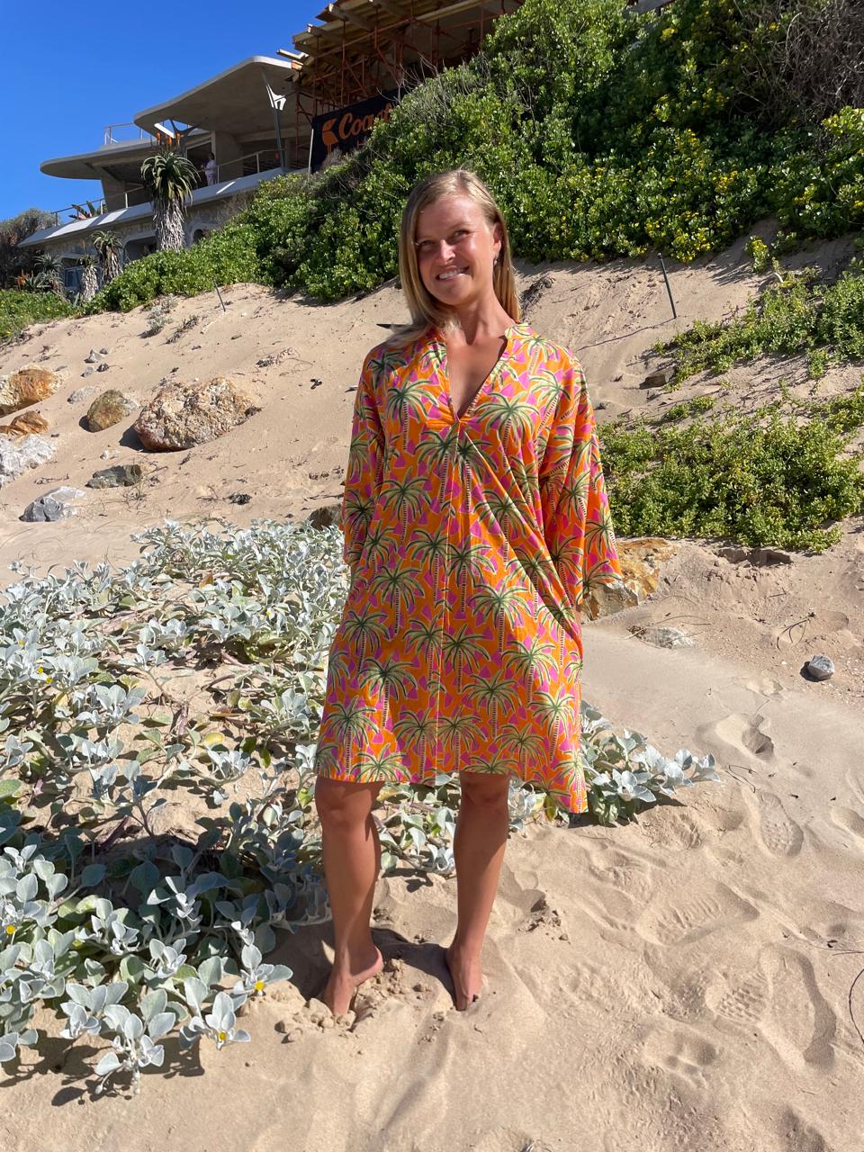 Orange dress with green & pink palm pattern