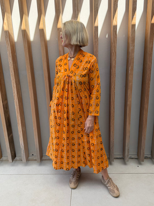 Orange geometric pattern dress