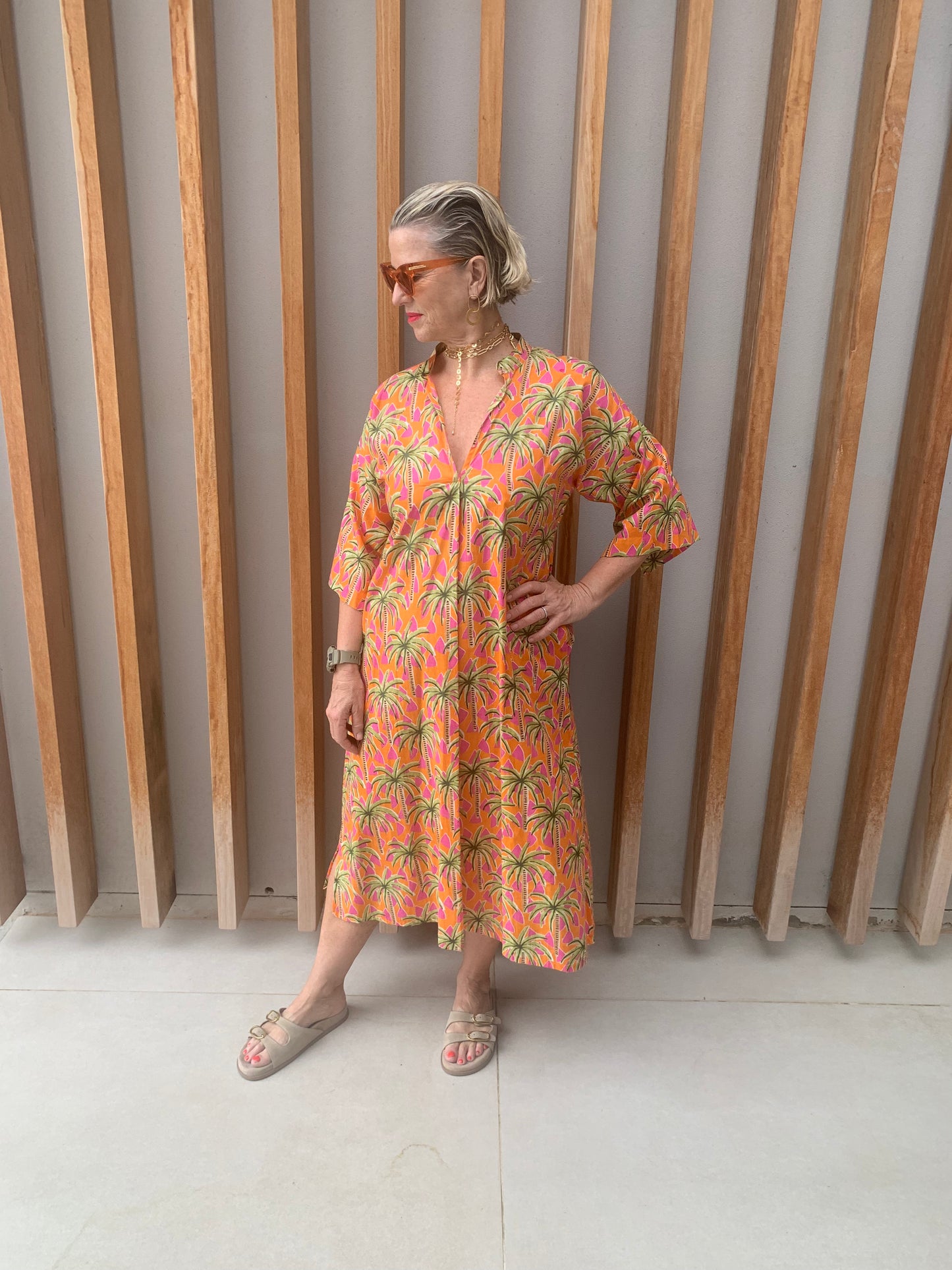 Orange dress with green & pink palm pattern (below knee)