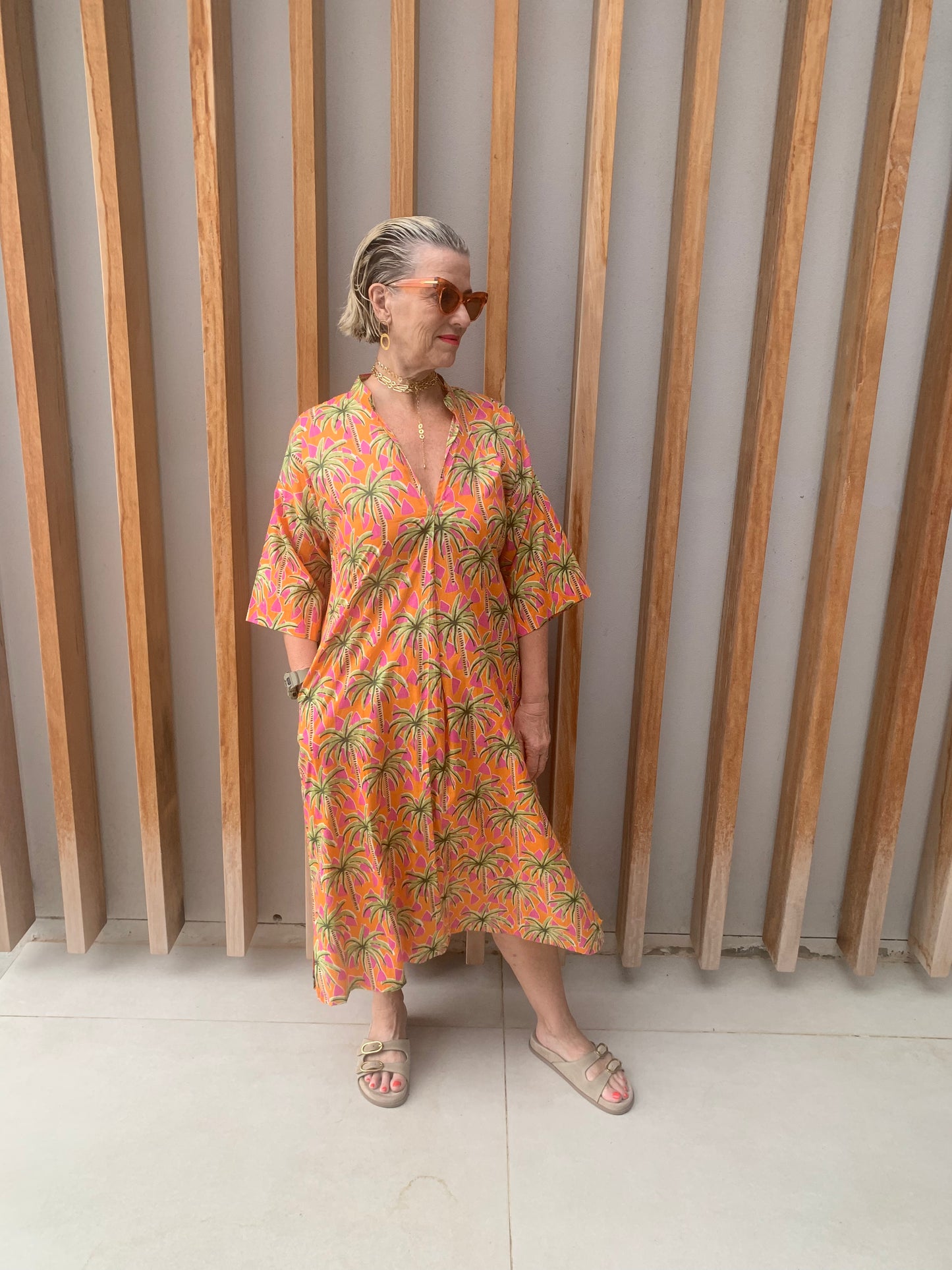 Orange dress with green & pink palm pattern (below knee)