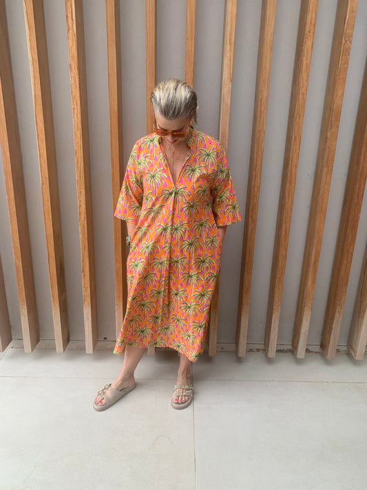 Orange dress with green & pink palm pattern (below knee)
