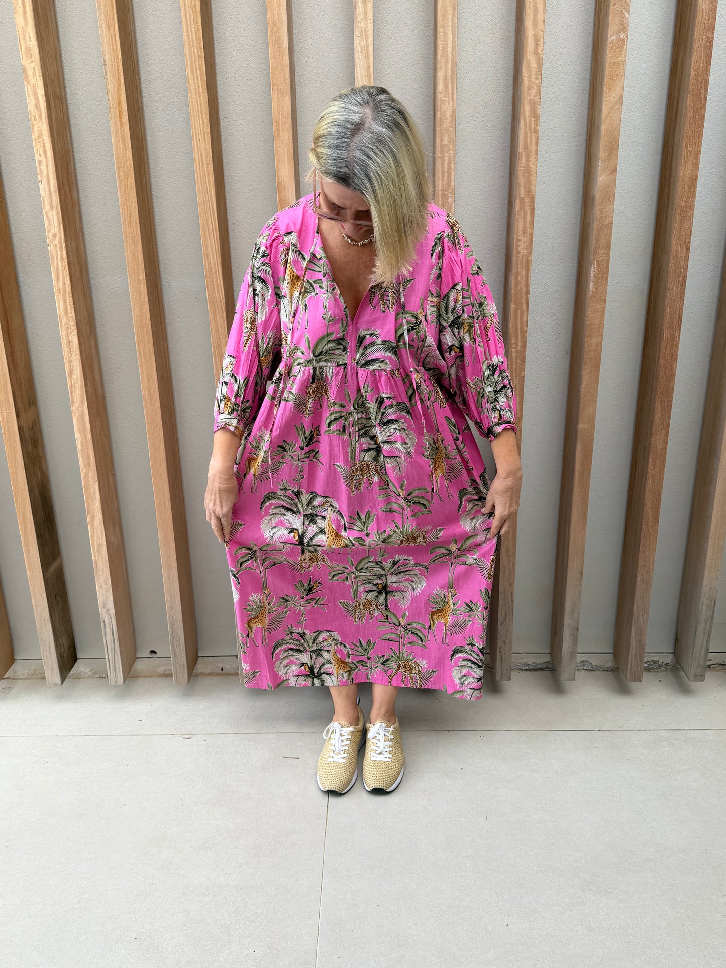 Pink dress with animal palm pattern