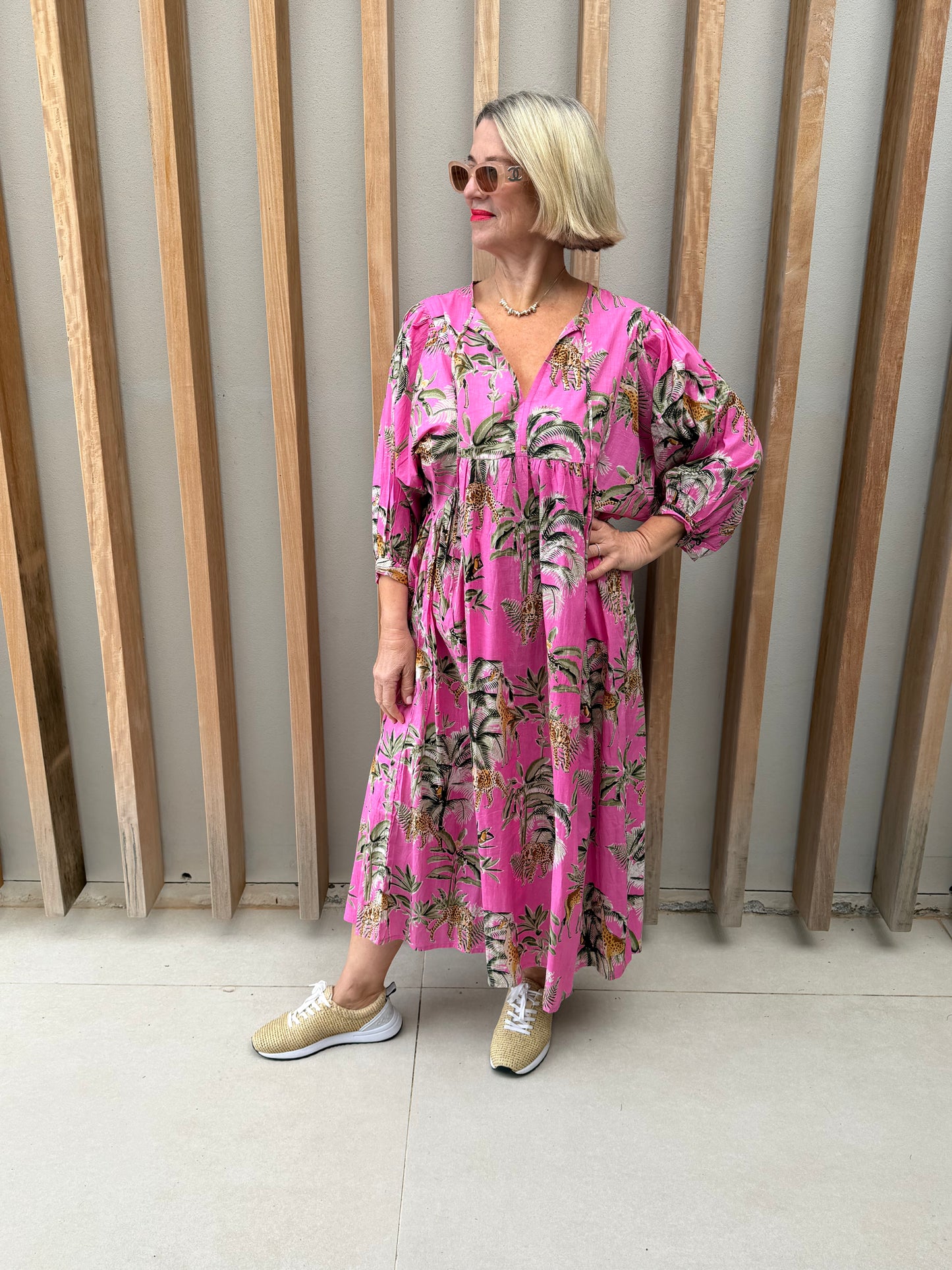 Pink dress with animal palm pattern