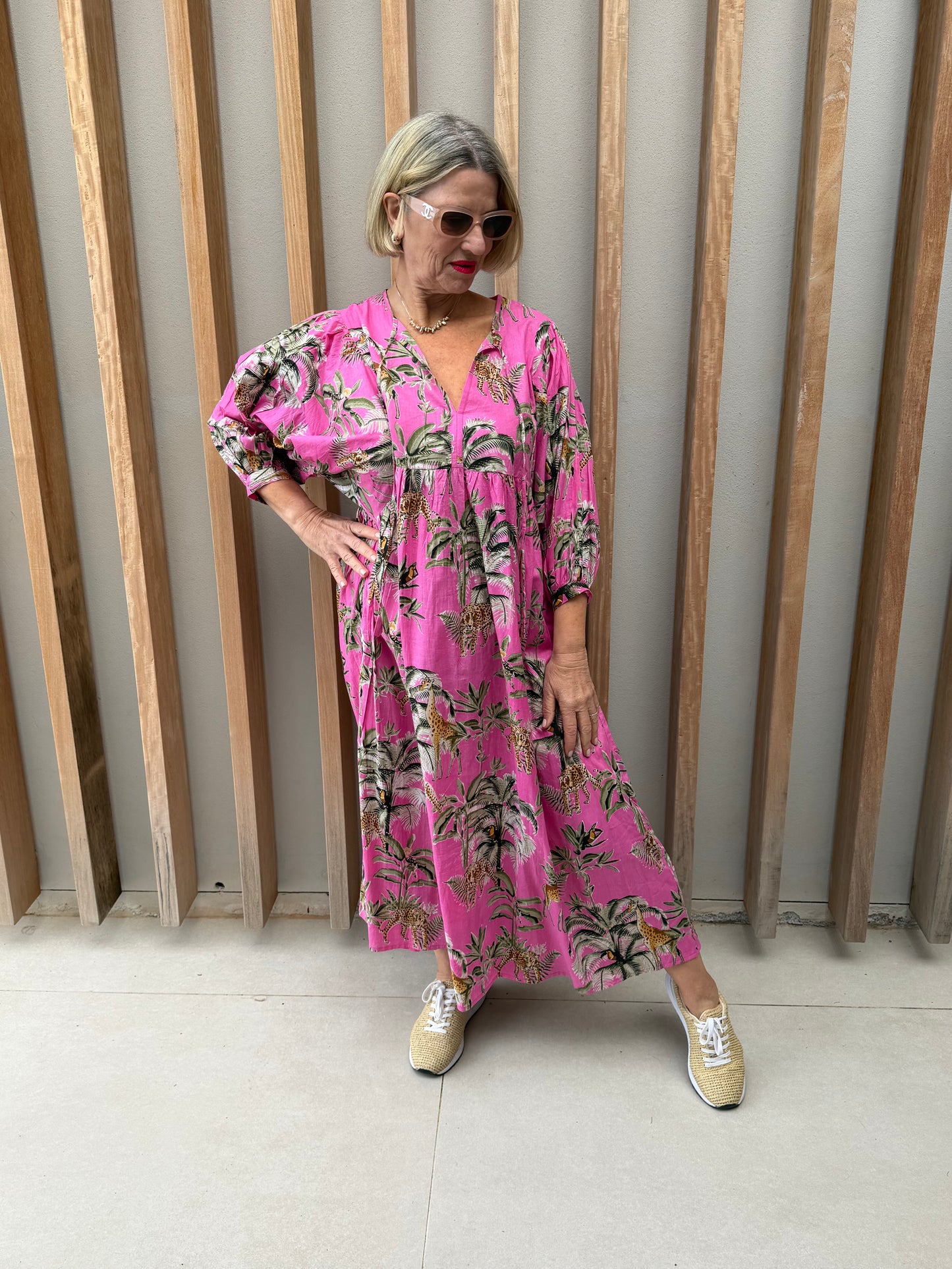 Pink dress with animal palm pattern