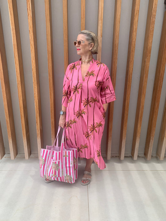 Pink dress with green palm pattern