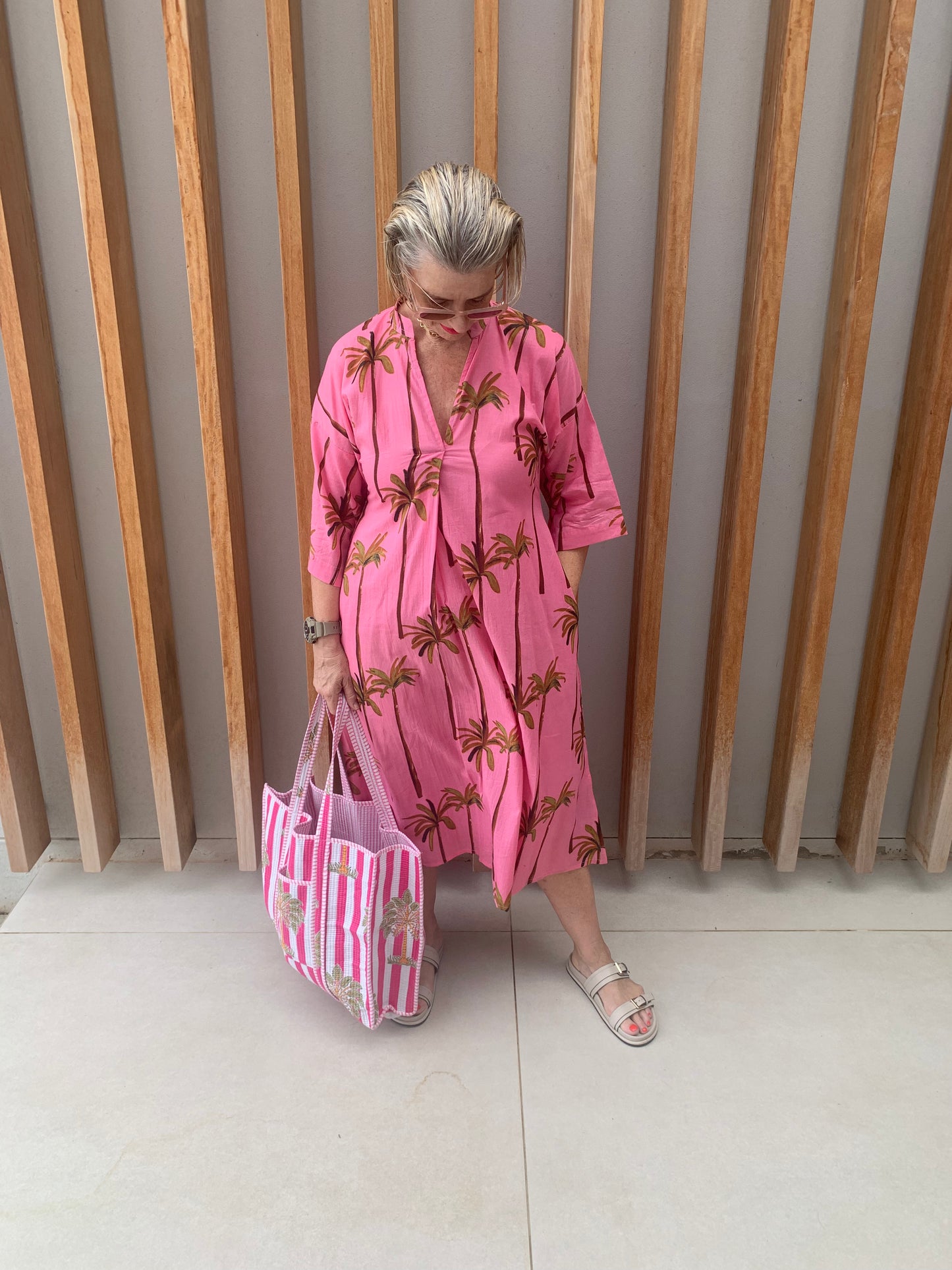 Pink dress with green palm pattern