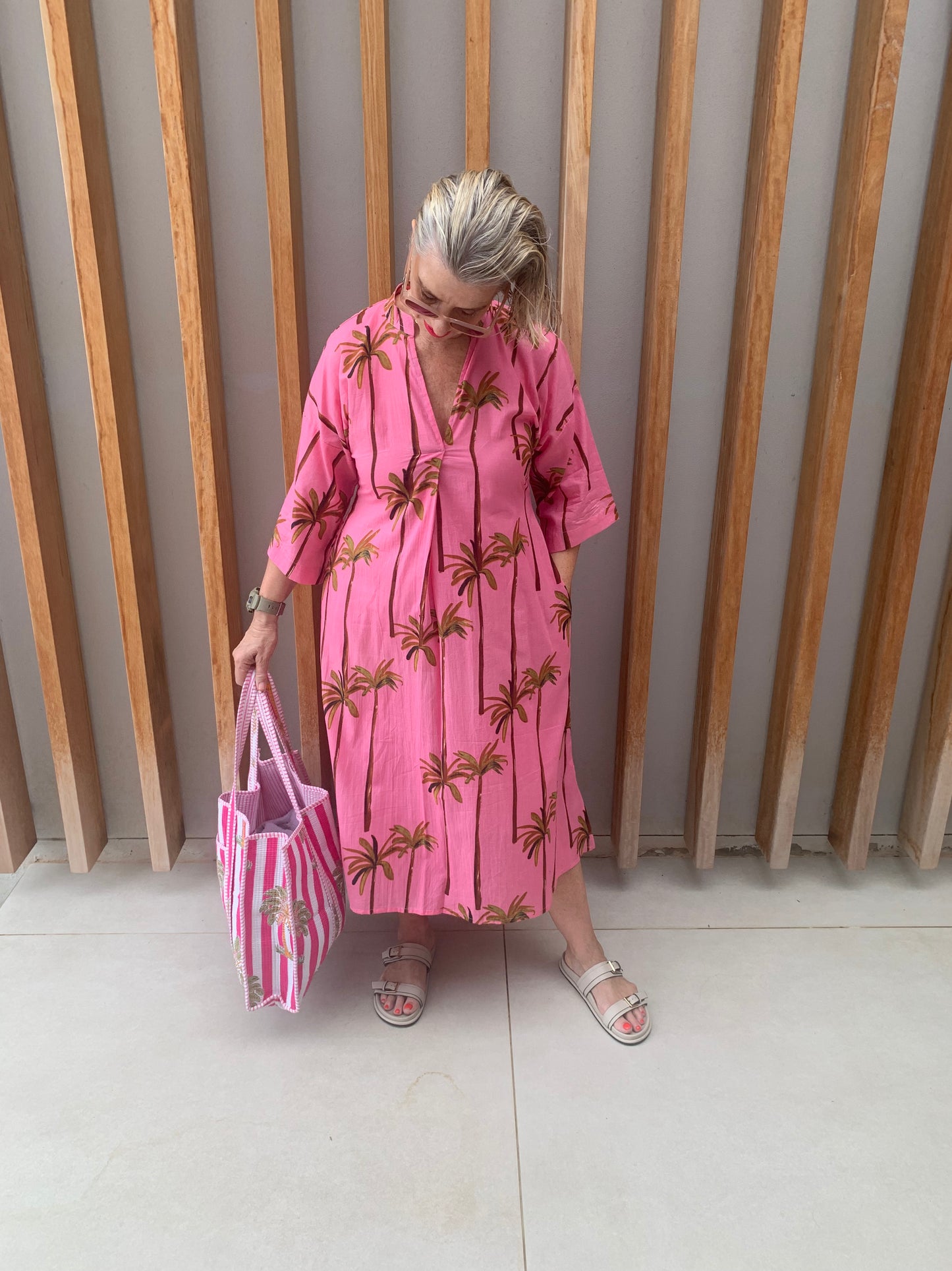 Pink dress with green palm pattern