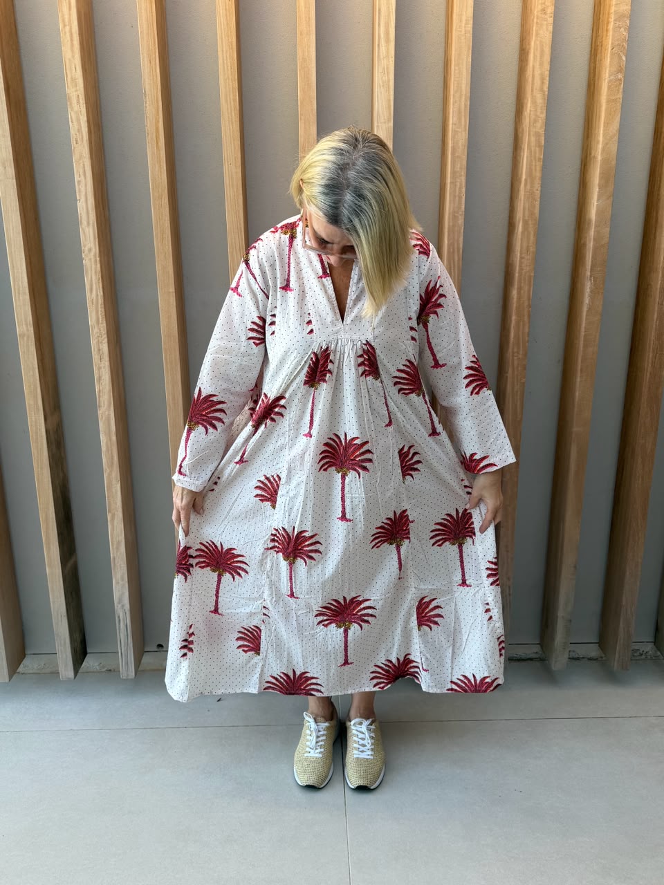 White dress with salmon pink palm pattern