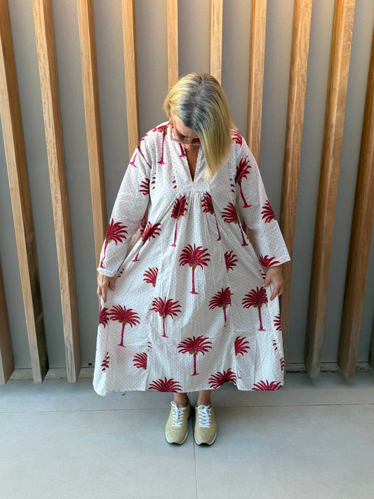 White dress with salmon pink palm pattern