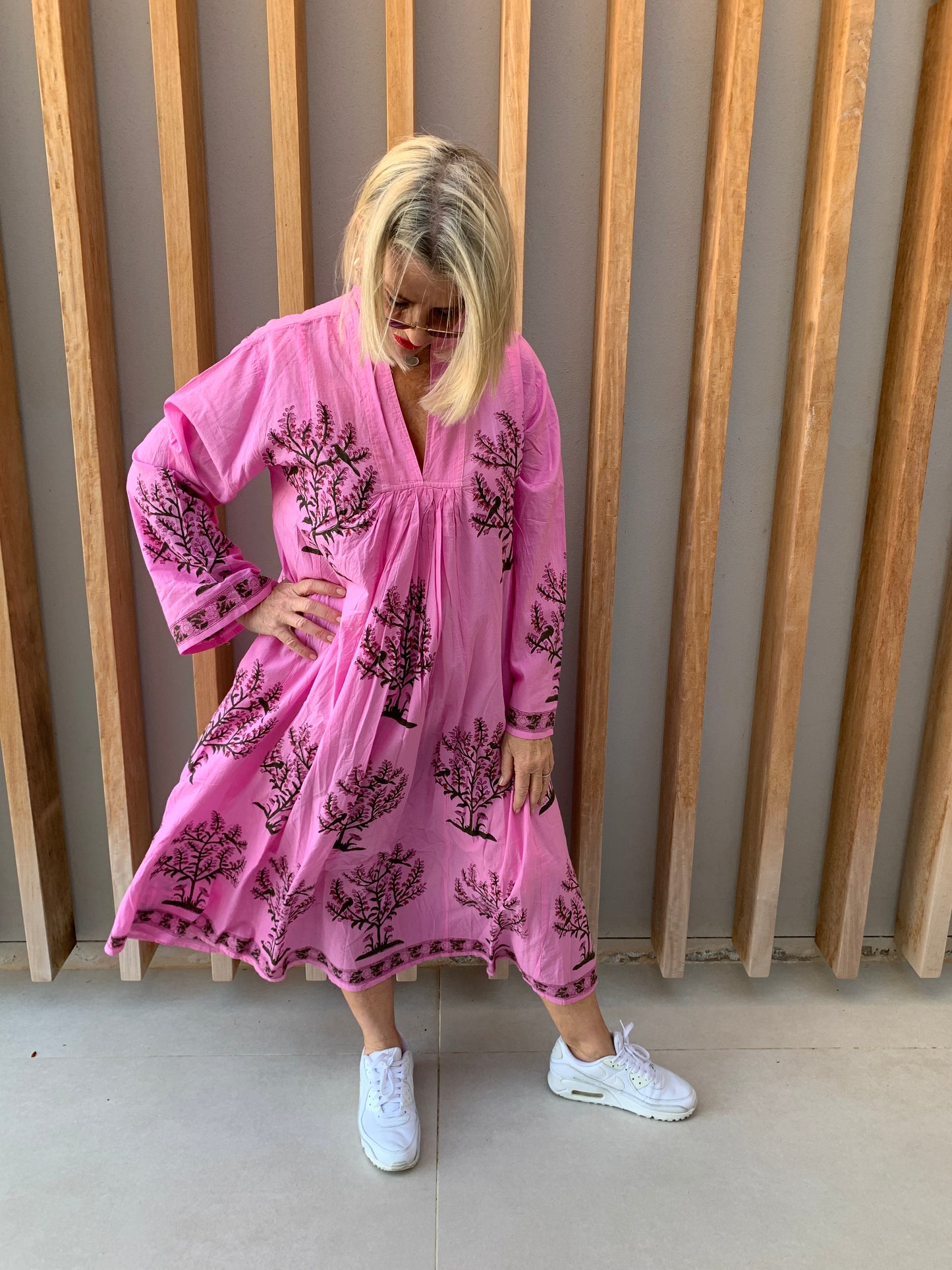 Pink dress with tree blossom pattern