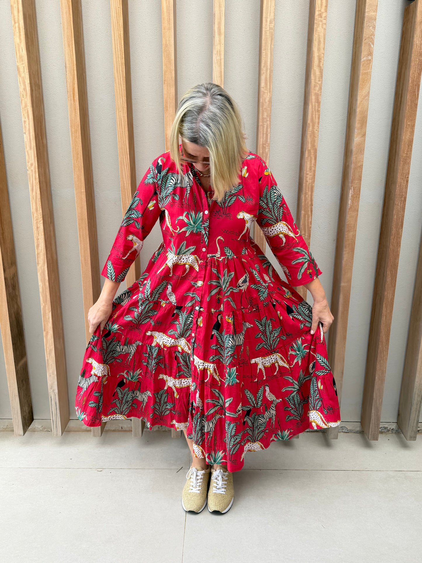 Red dress with animal palm pattern