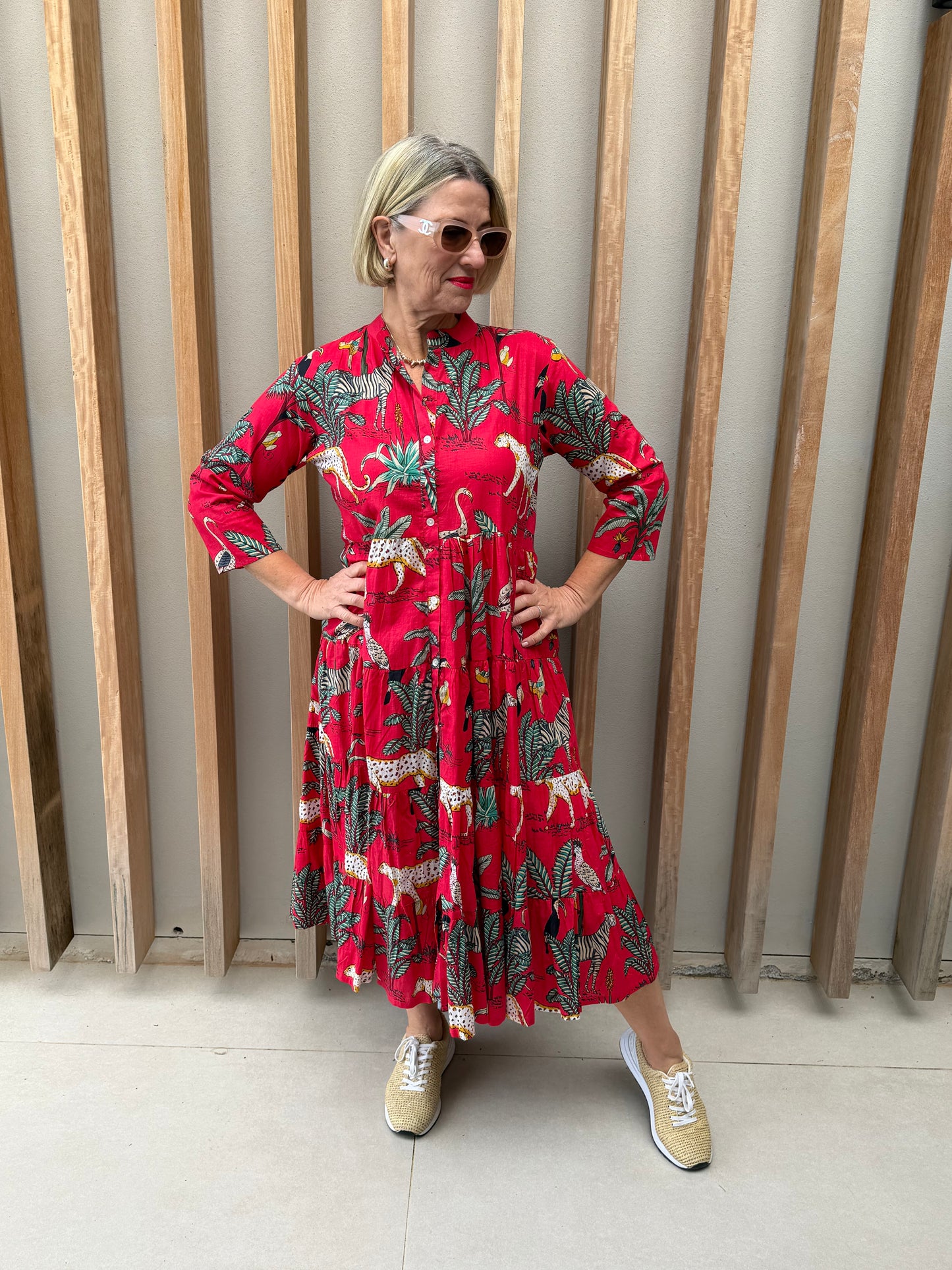 Red dress with animal palm pattern