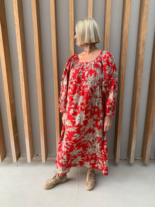 Red dress with beige floral pattern