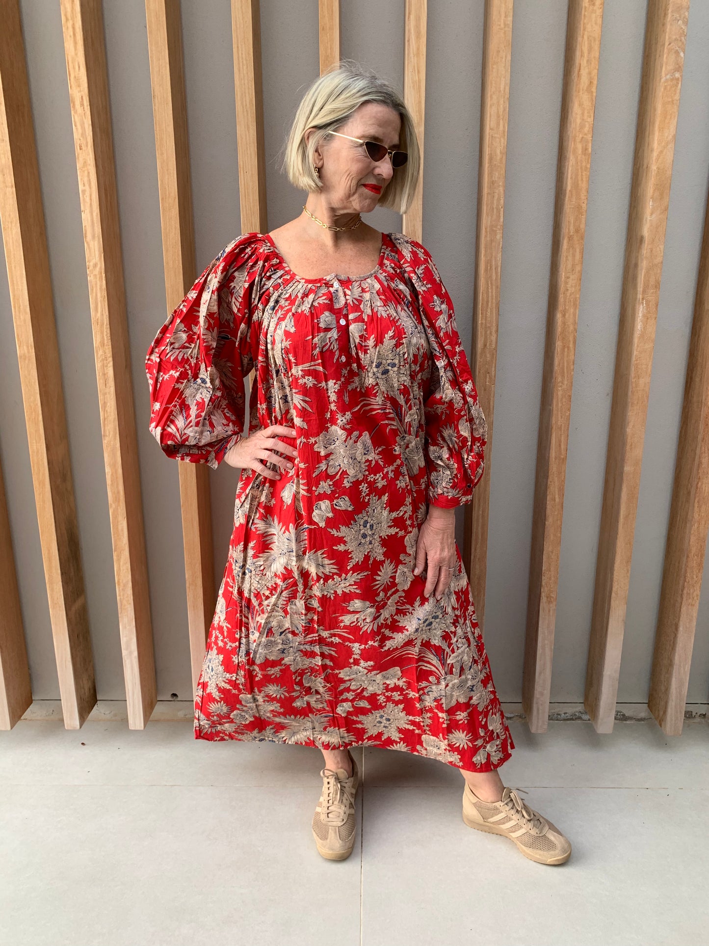Red dress with beige floral pattern