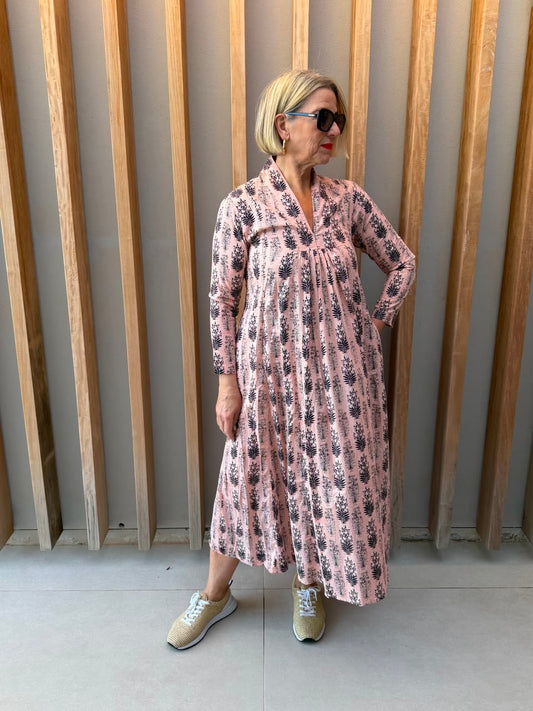 Salmon pink dress with black floral pattern