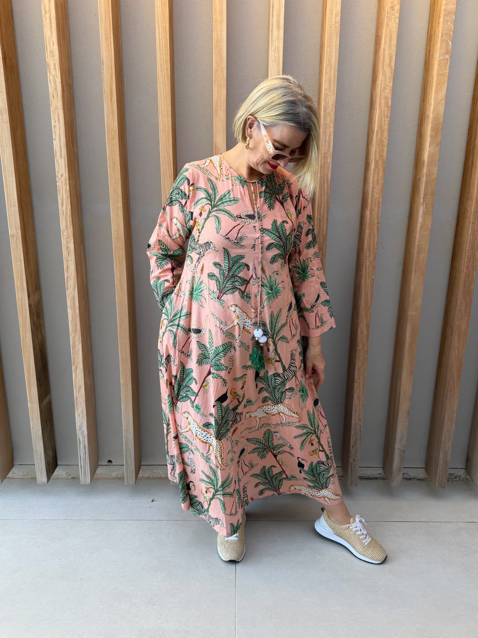 Salmon pink dress with animal palm pattern