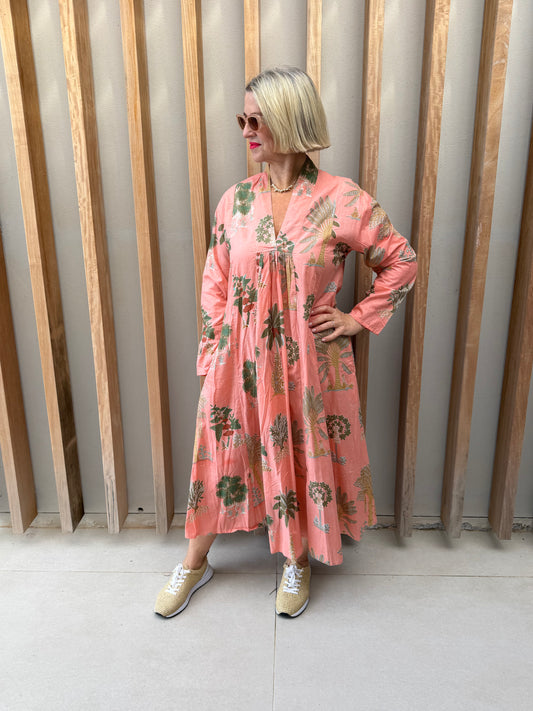 Salmon dress with floral palm pattern