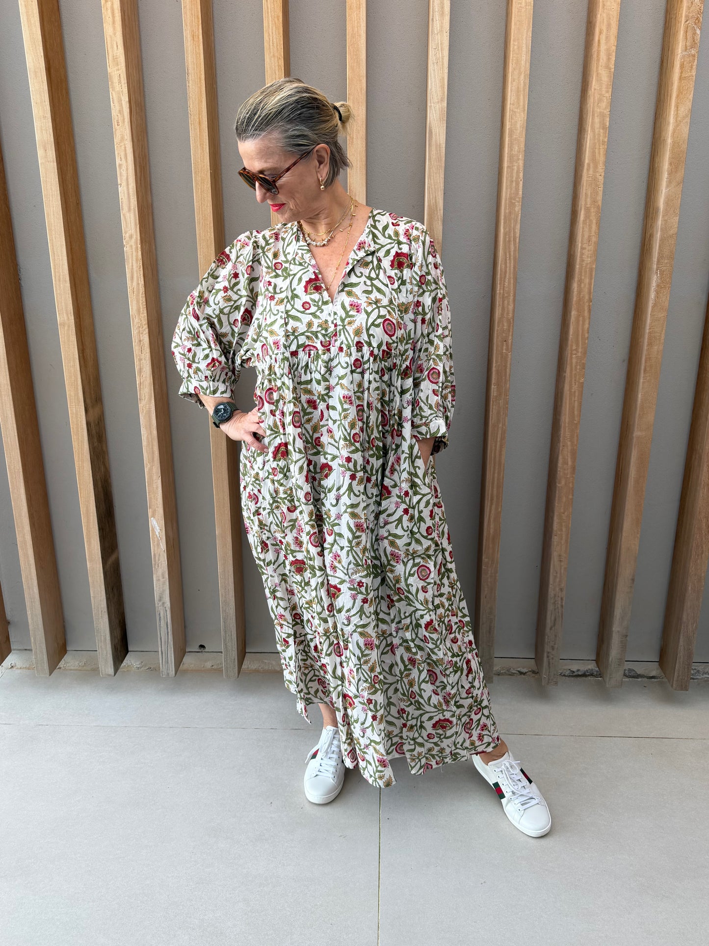 White dress with red & green floral pattern