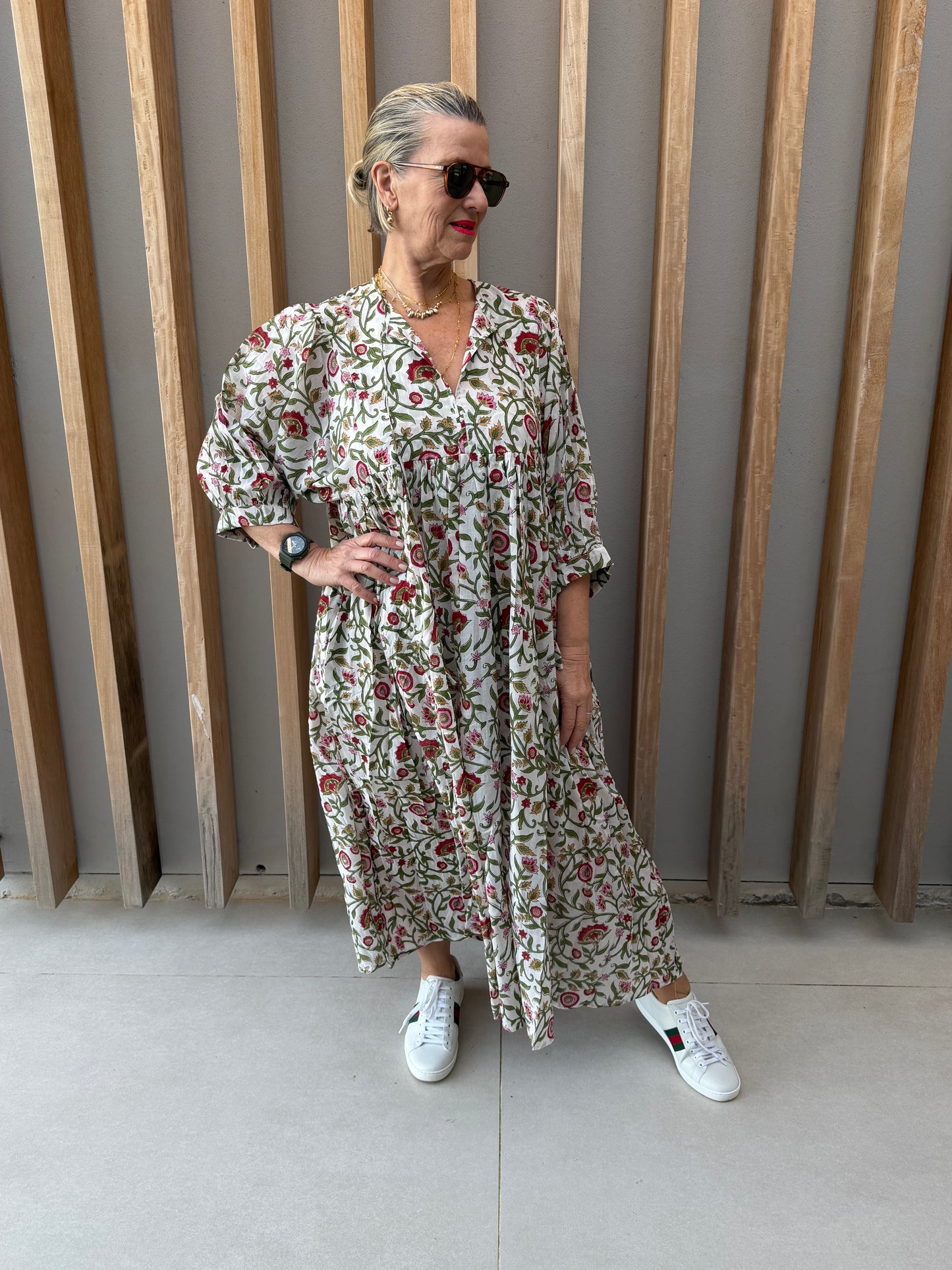 White dress with red & green floral pattern