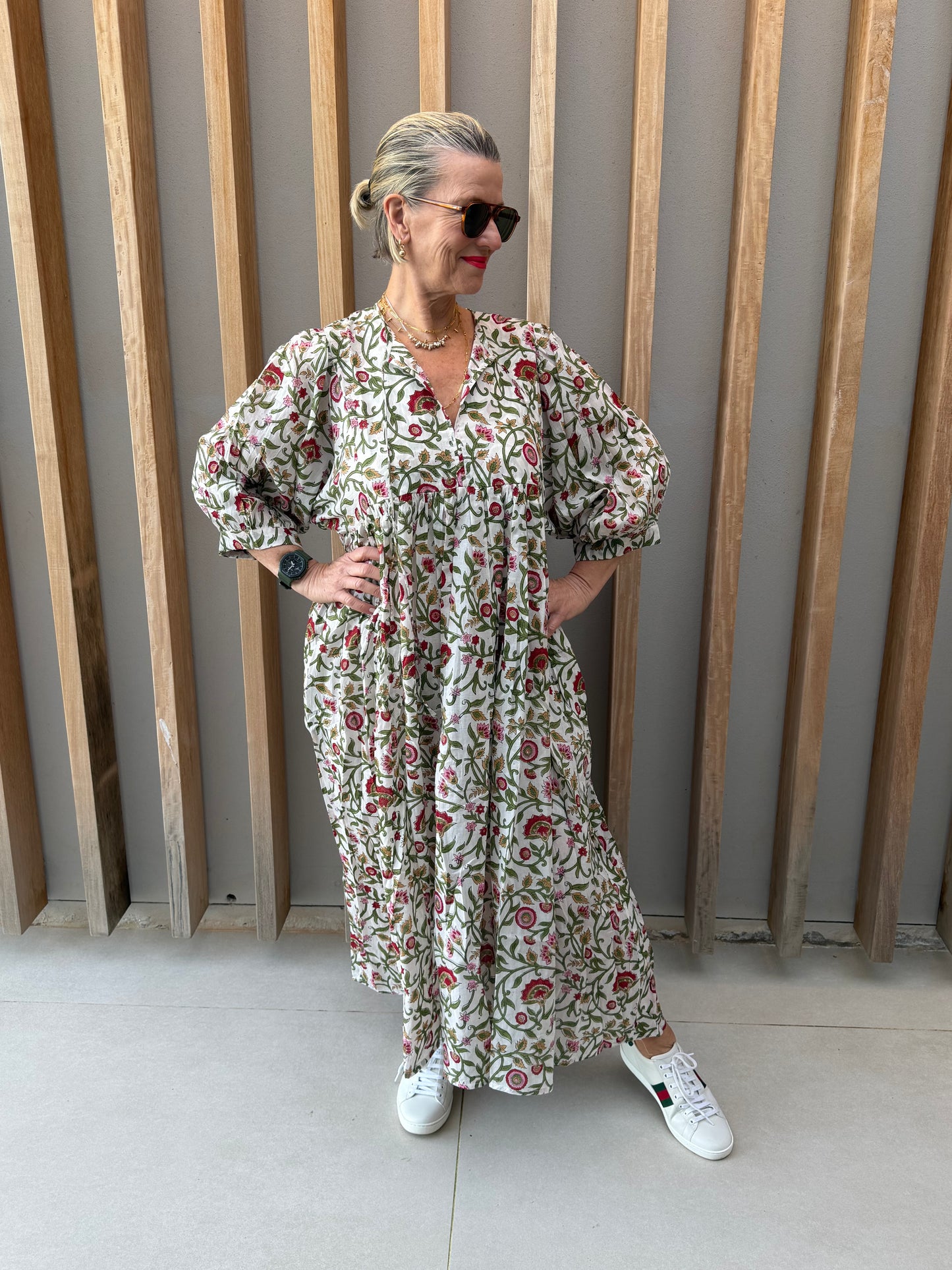 White dress with red & green floral pattern