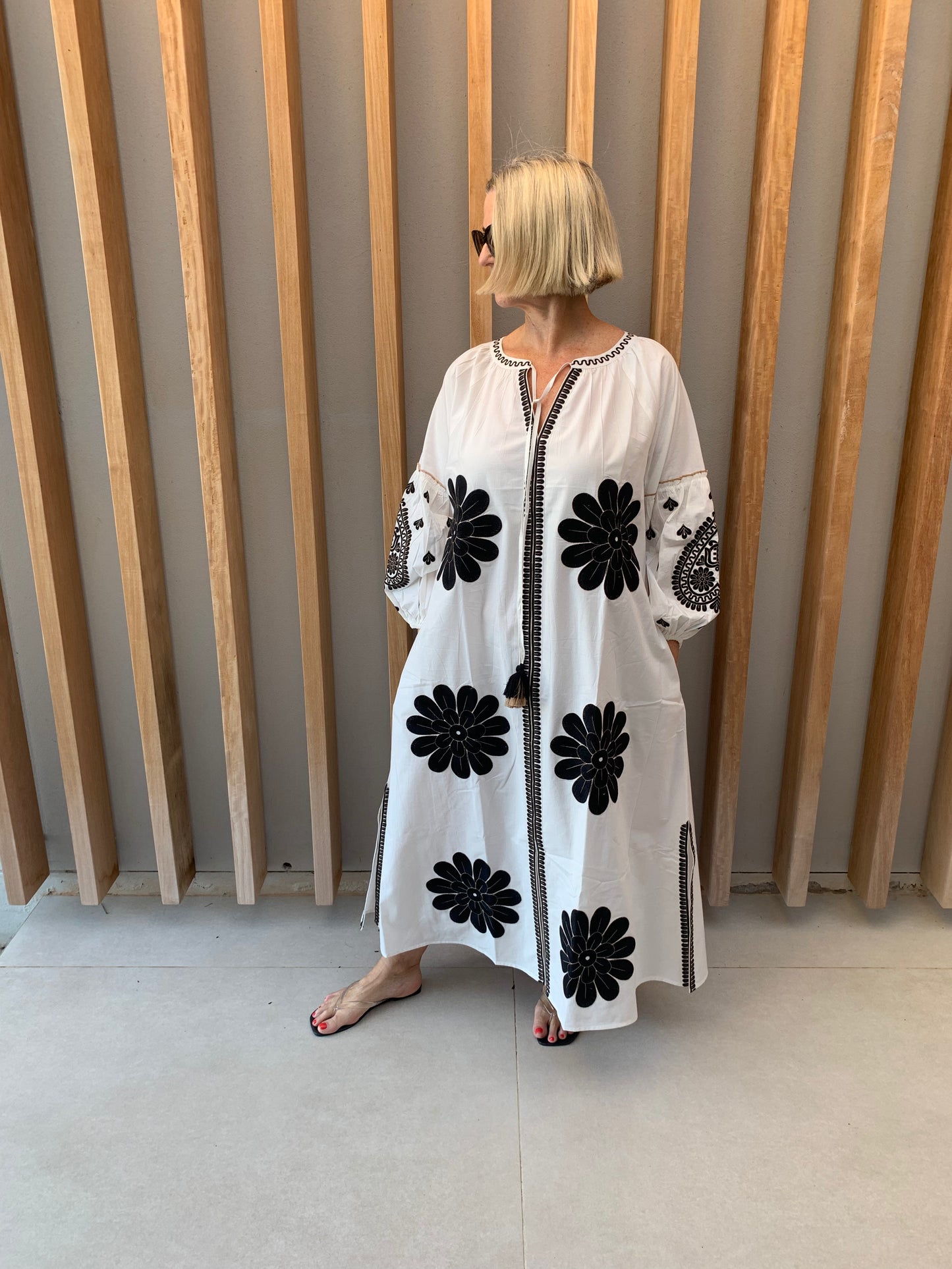 White dress with black geometric pattern