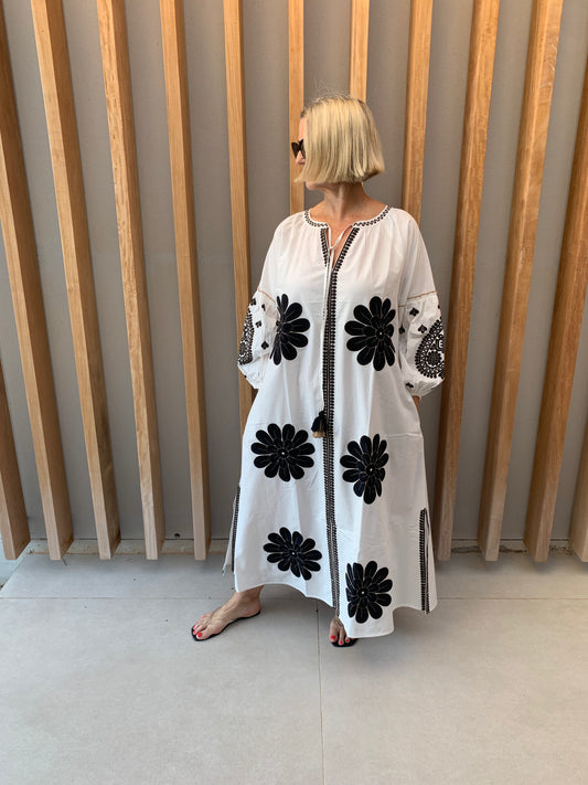 White dress with black geometric pattern