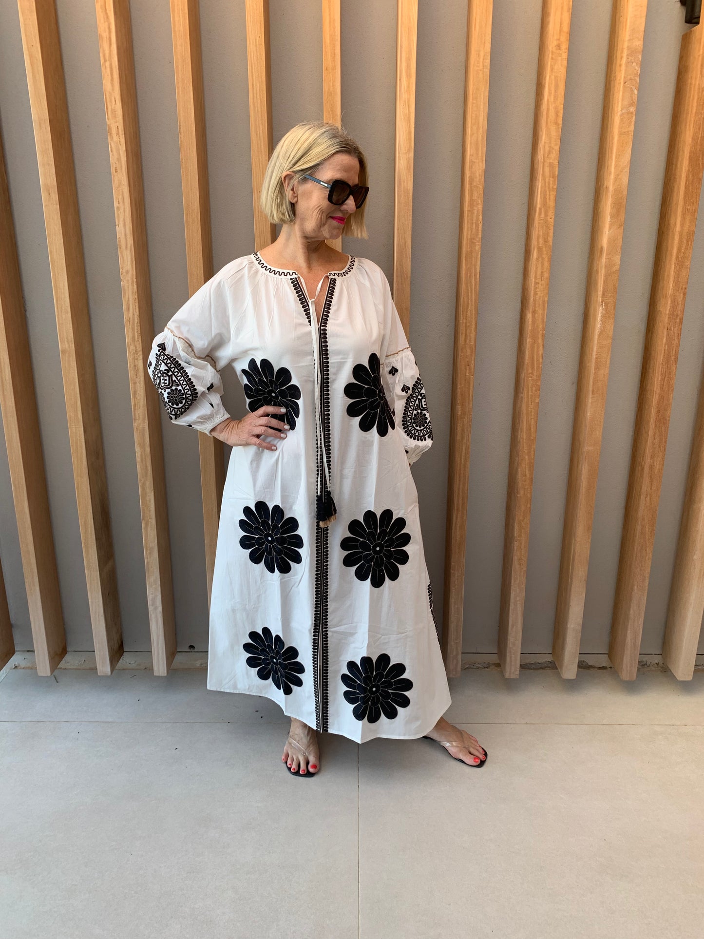 White dress with black geometric pattern