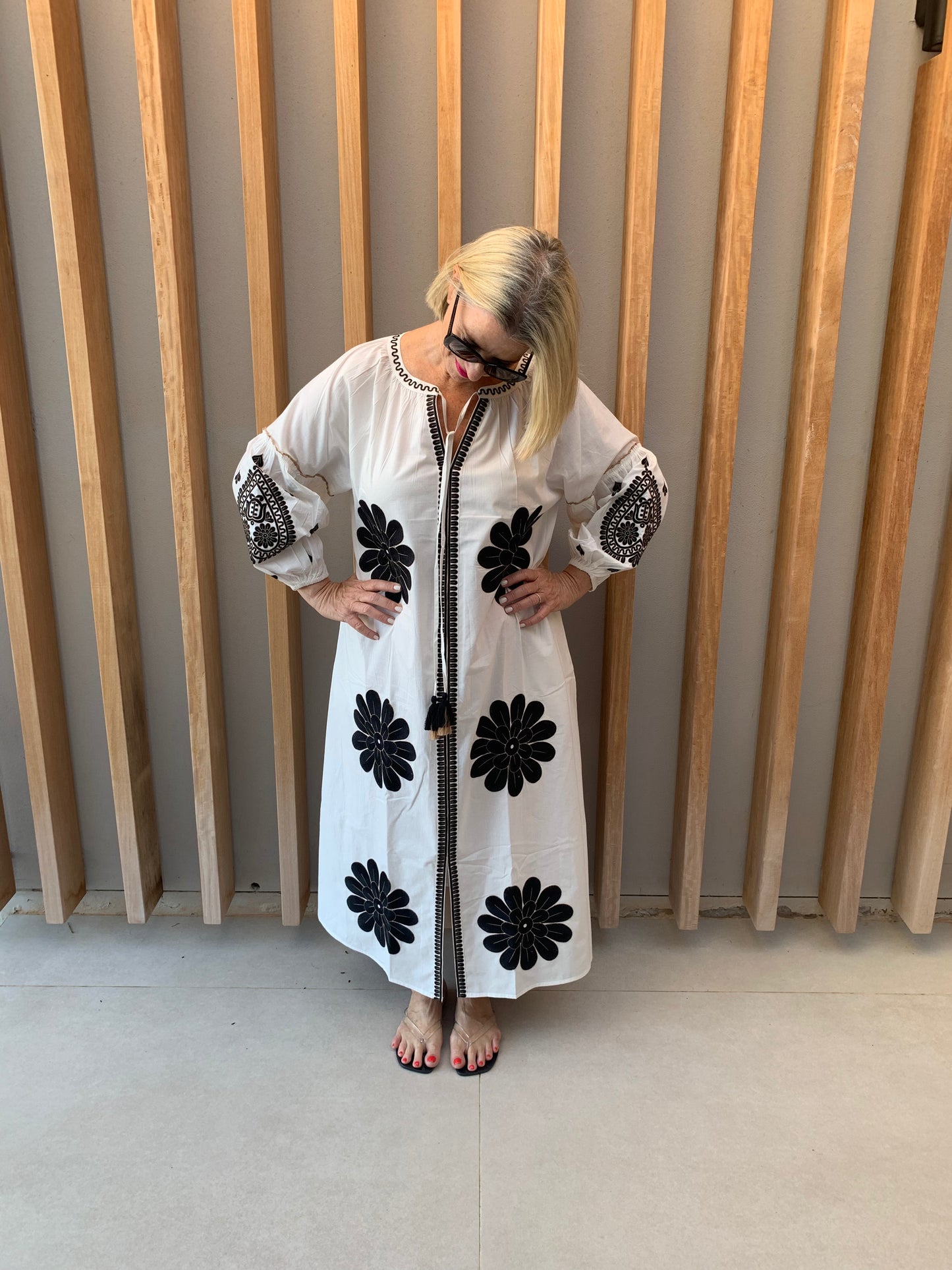 White dress with black geometric pattern