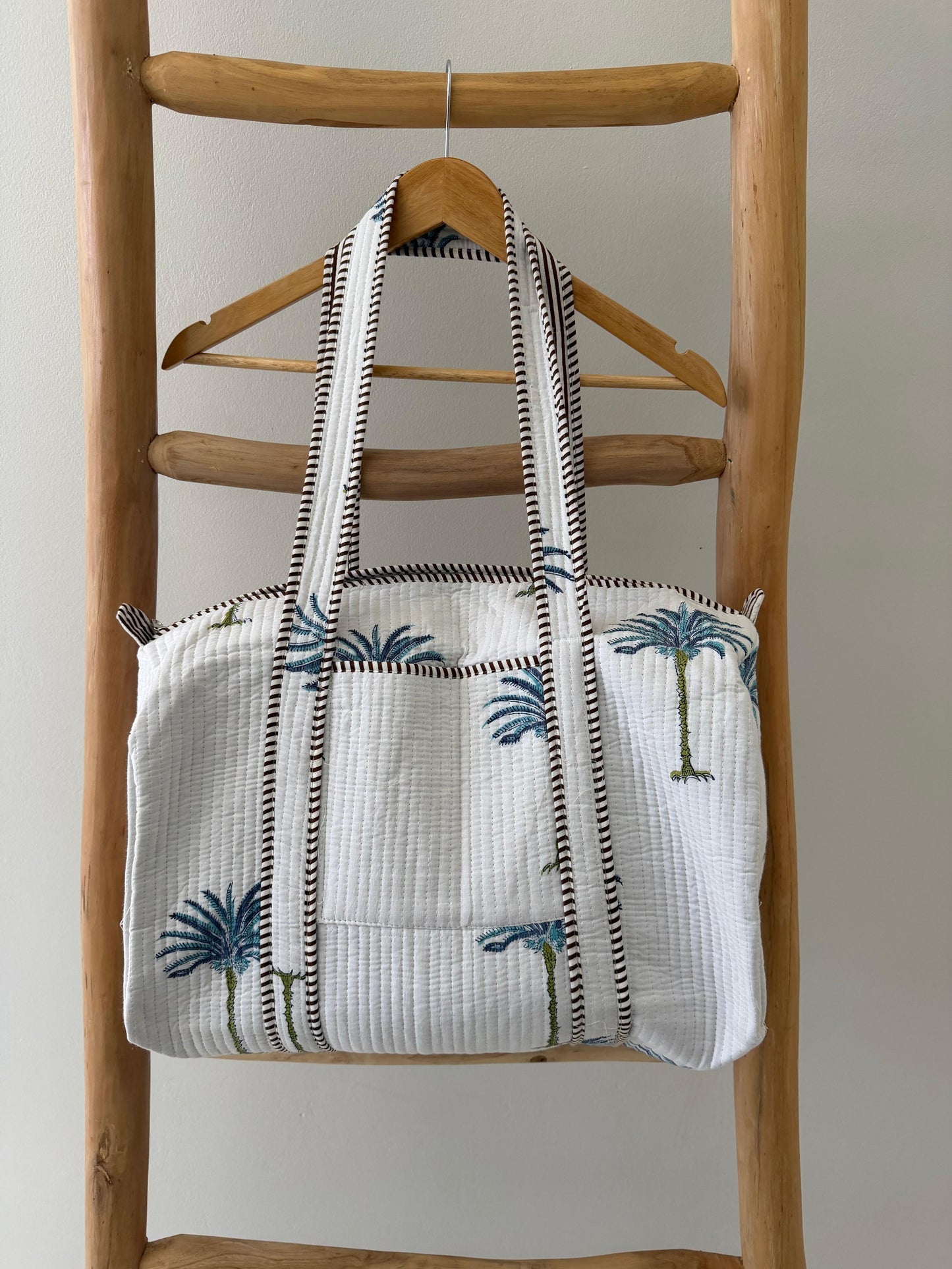 White Duffle Bag with blue palm pattern