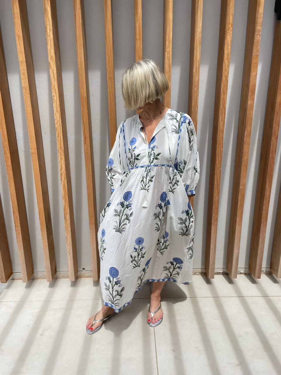 White dress with blue poppy